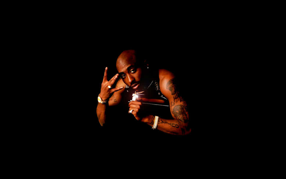 Tupac Shakur Peace Sign Dark Background Wallpaper