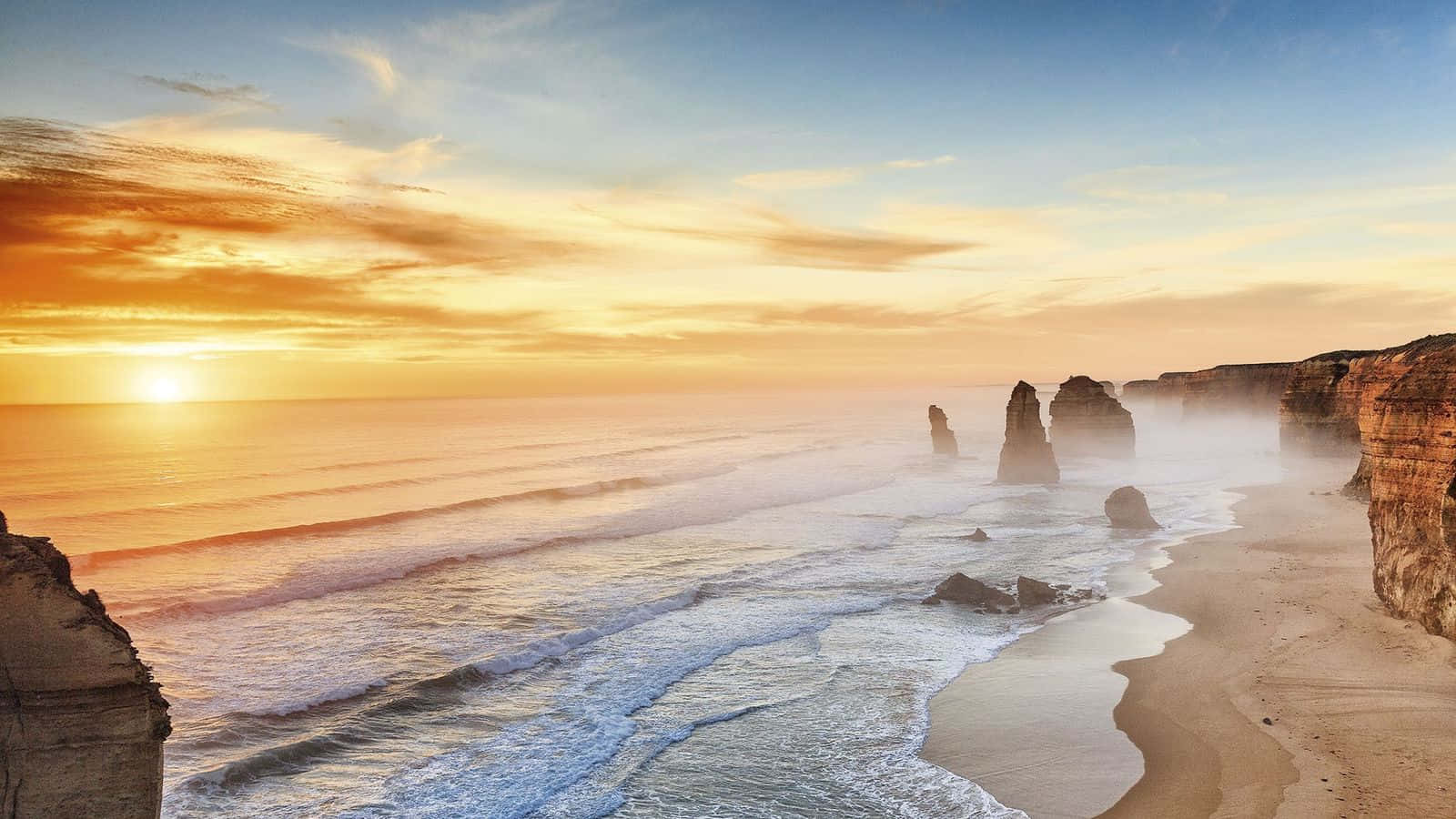 Twelve Apostles In Victoria Australia During Golden Hour Wallpaper