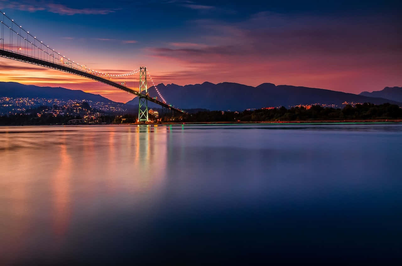 Twilight Suspension Bridge Reflection Wallpaper