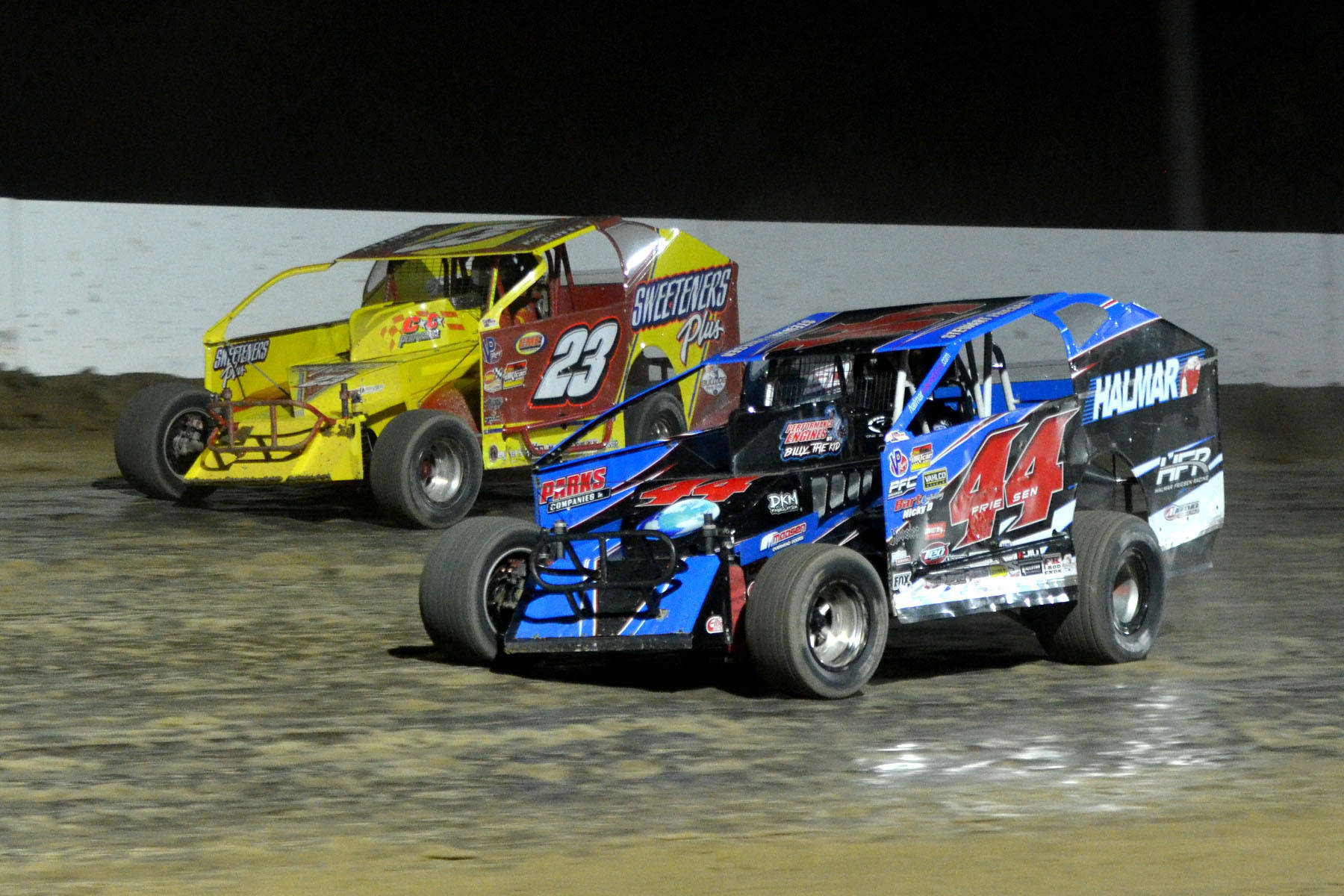 Two Dirt Cars Racing Wallpaper