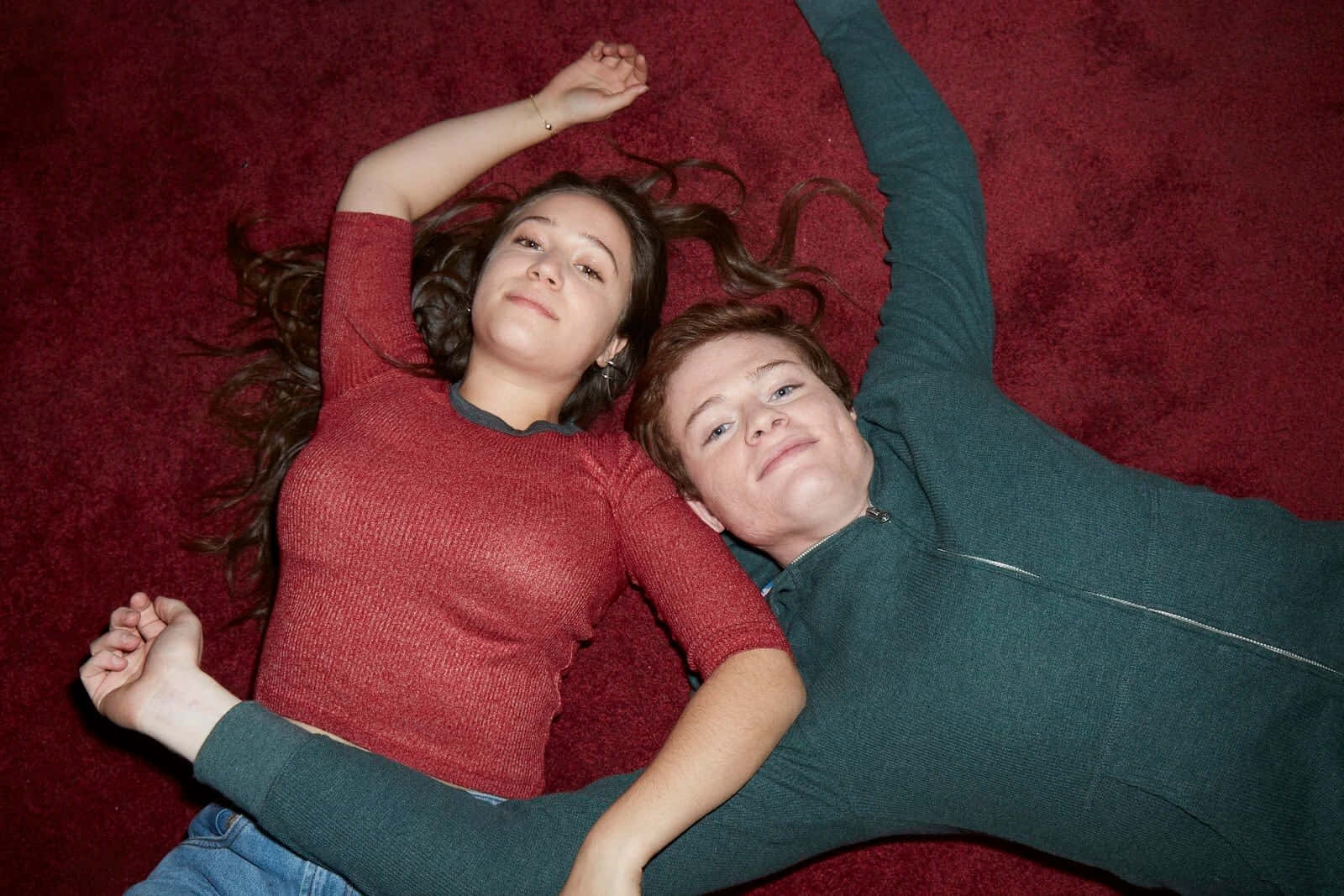 Two Friends Lying On Carpet Wallpaper