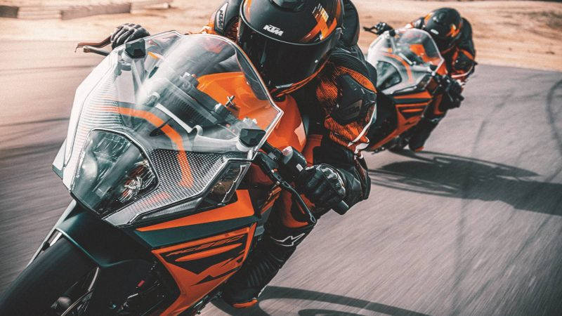 Two Ktm Rc 200s Racing Wallpaper