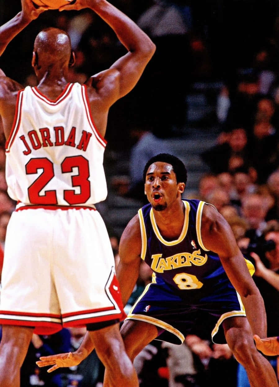 Two Legends: A Look At Michael Jordan And Kobe Bryant Side By Side. Wallpaper