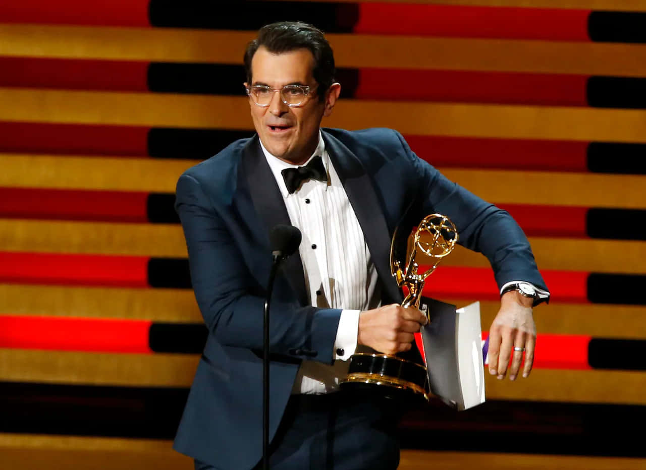 Ty Burrell Smiles At An Event Wallpaper