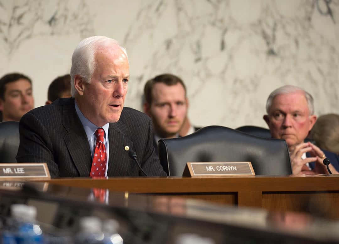 U.s. Senator John Cornyn During A Senate Hearing Wallpaper