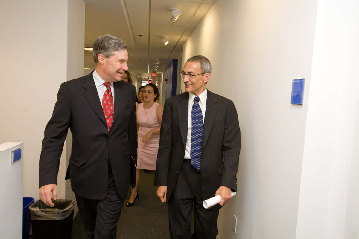 U.s. Senator Sheldon Whitehouse Speaking At An Event Wallpaper