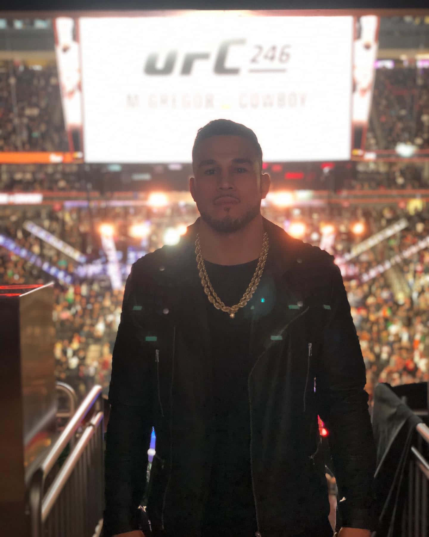 Ufc Fighter Brad Tavares In Front Of Crowd Wallpaper