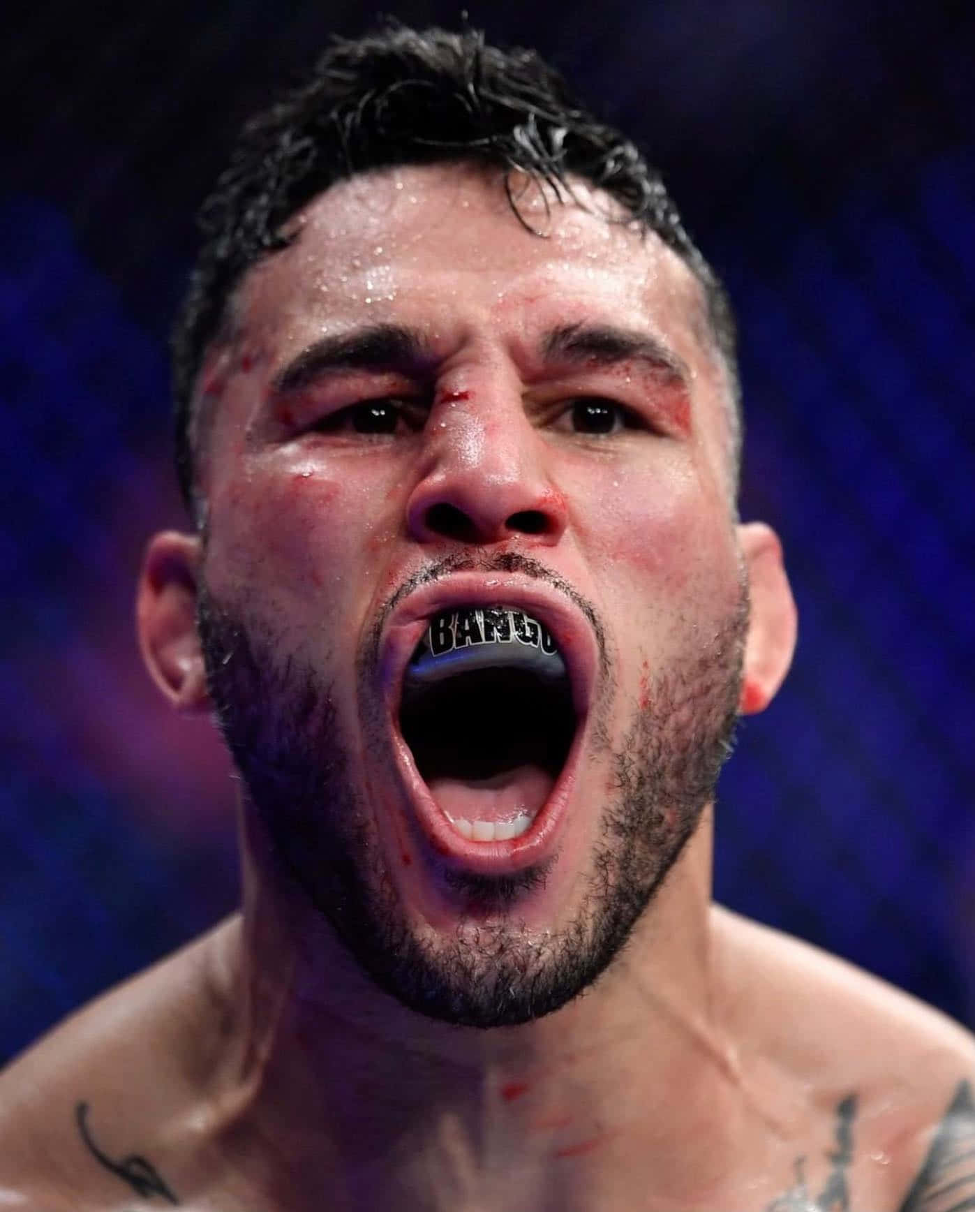 Ufc Fighter Brad Tavares Wearing Mouth Guard Wallpaper