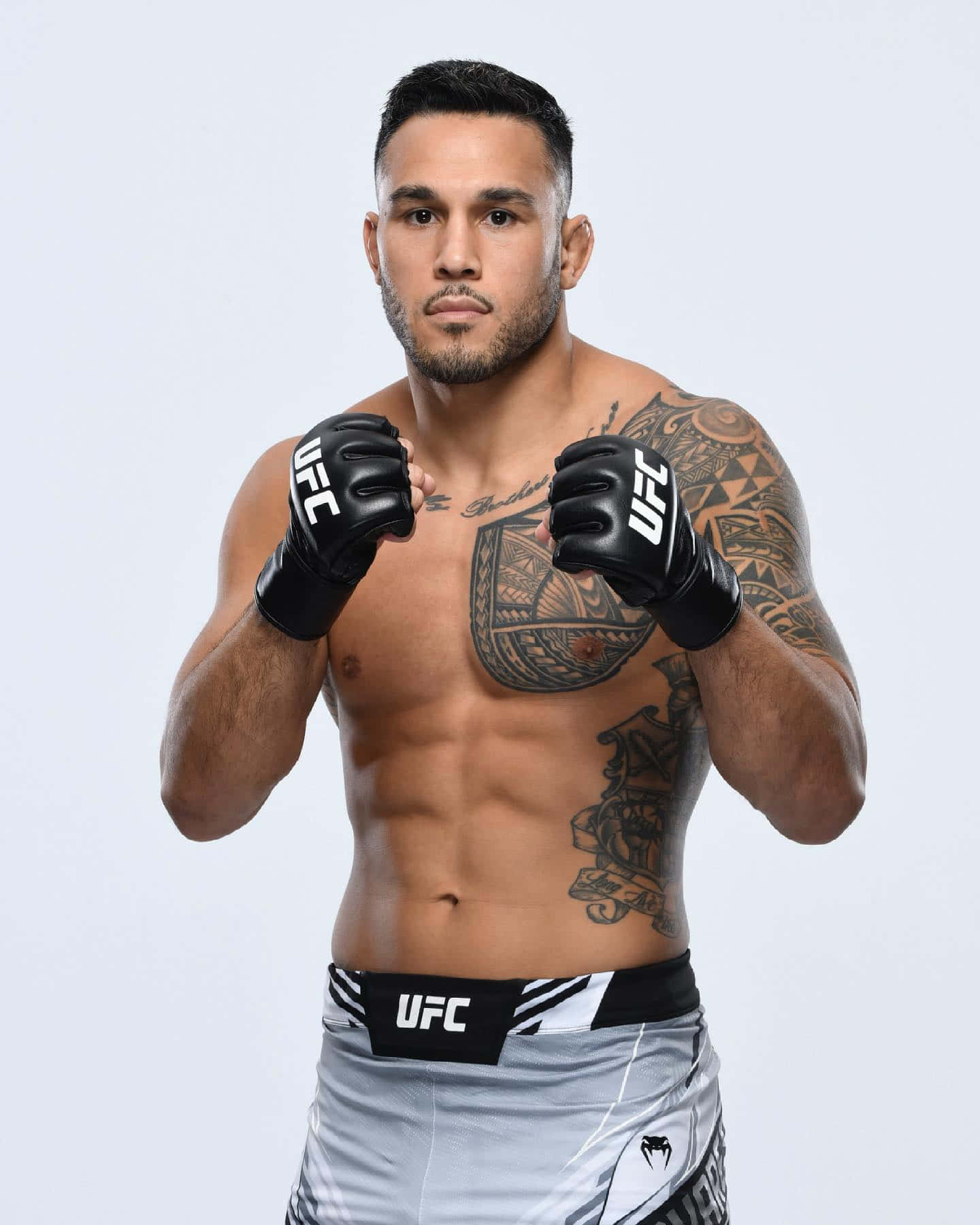 Ufc Fighter Brad Tavares With White Backdrop Wallpaper