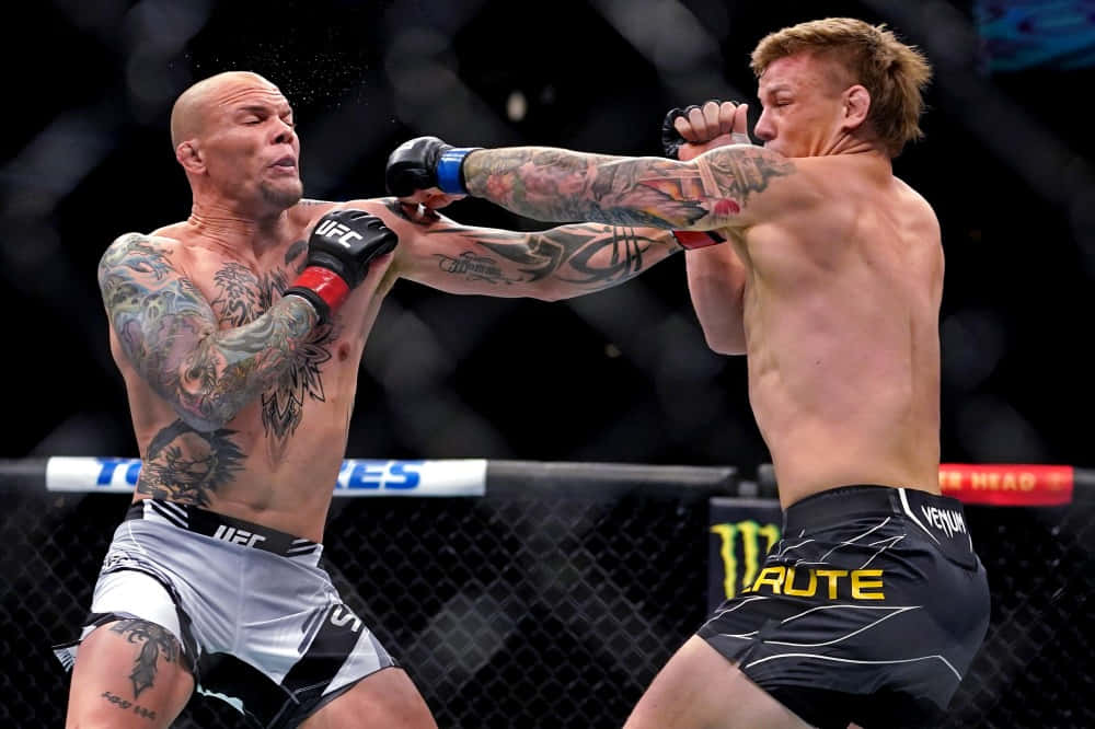 Ufc Fighter Jimmy Crute Throwing Punches Wallpaper