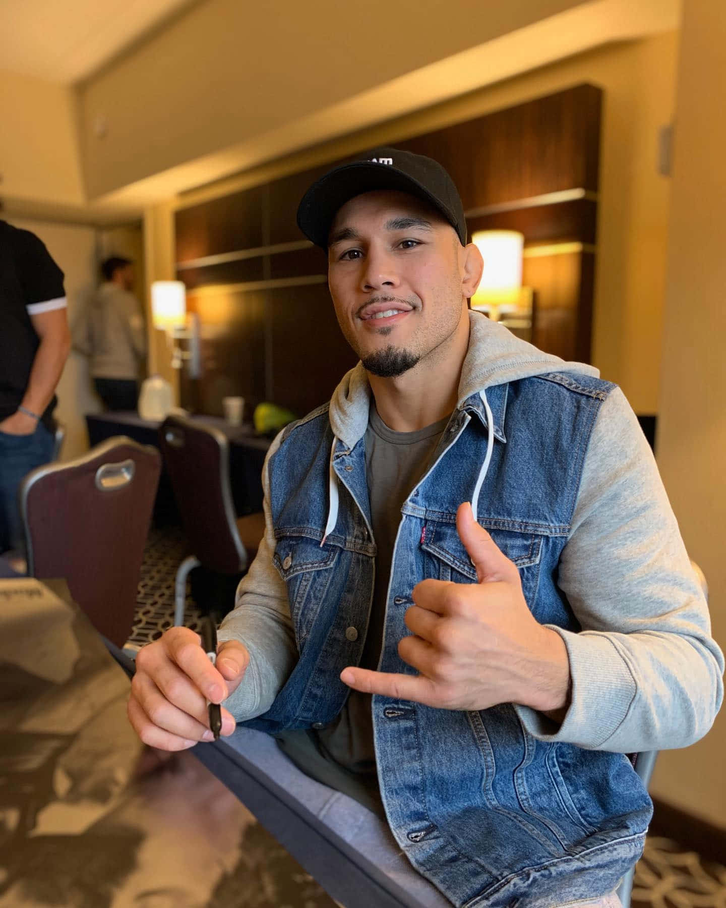 Ufc's Brad Tavares In Denim Jacket Wallpaper