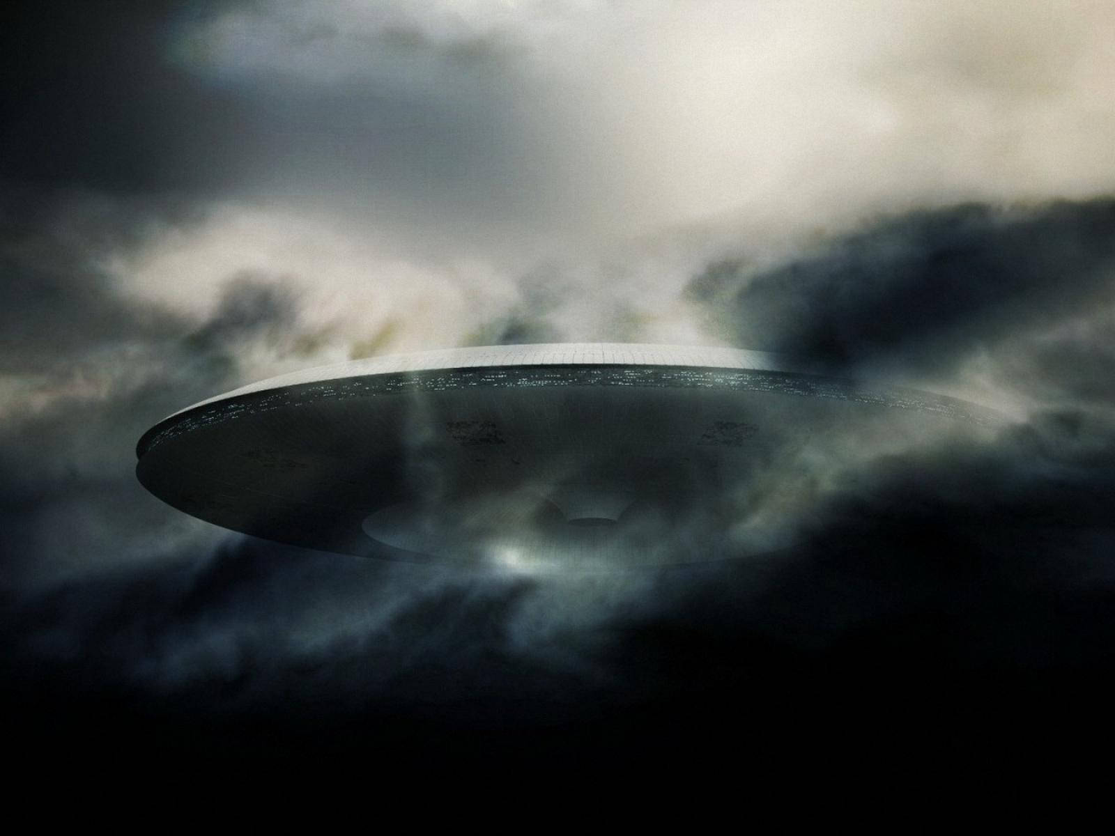 Ufo In Clouds Wallpaper