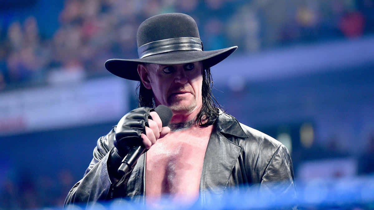 Undertaker In The Ring With Microphone Wallpaper