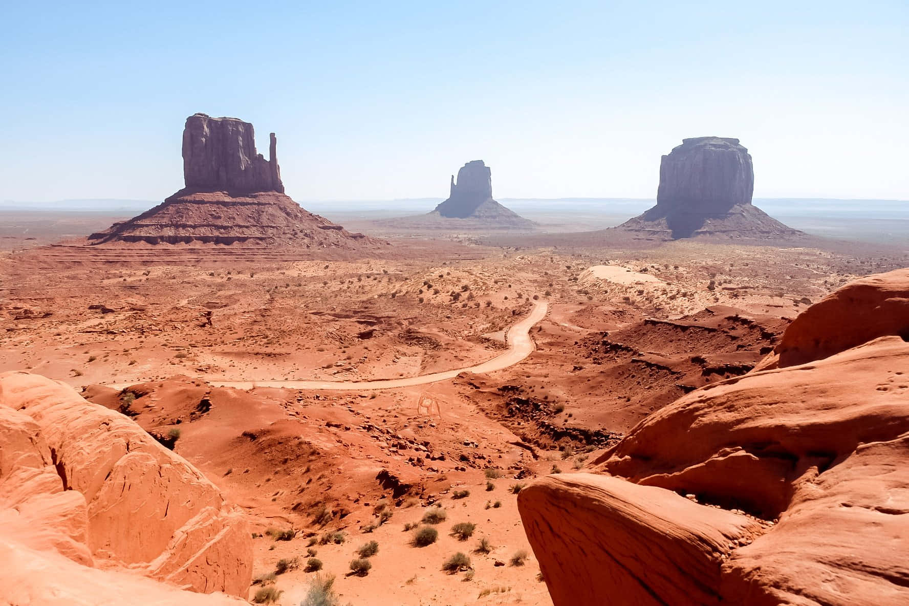 Unforgettable Hues Of Monument Valley Navajo Tribal Park Wallpaper