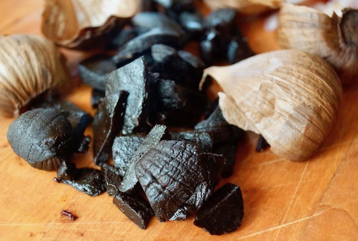 Unleash The Flavourful Power Of Black Garlic Wallpaper