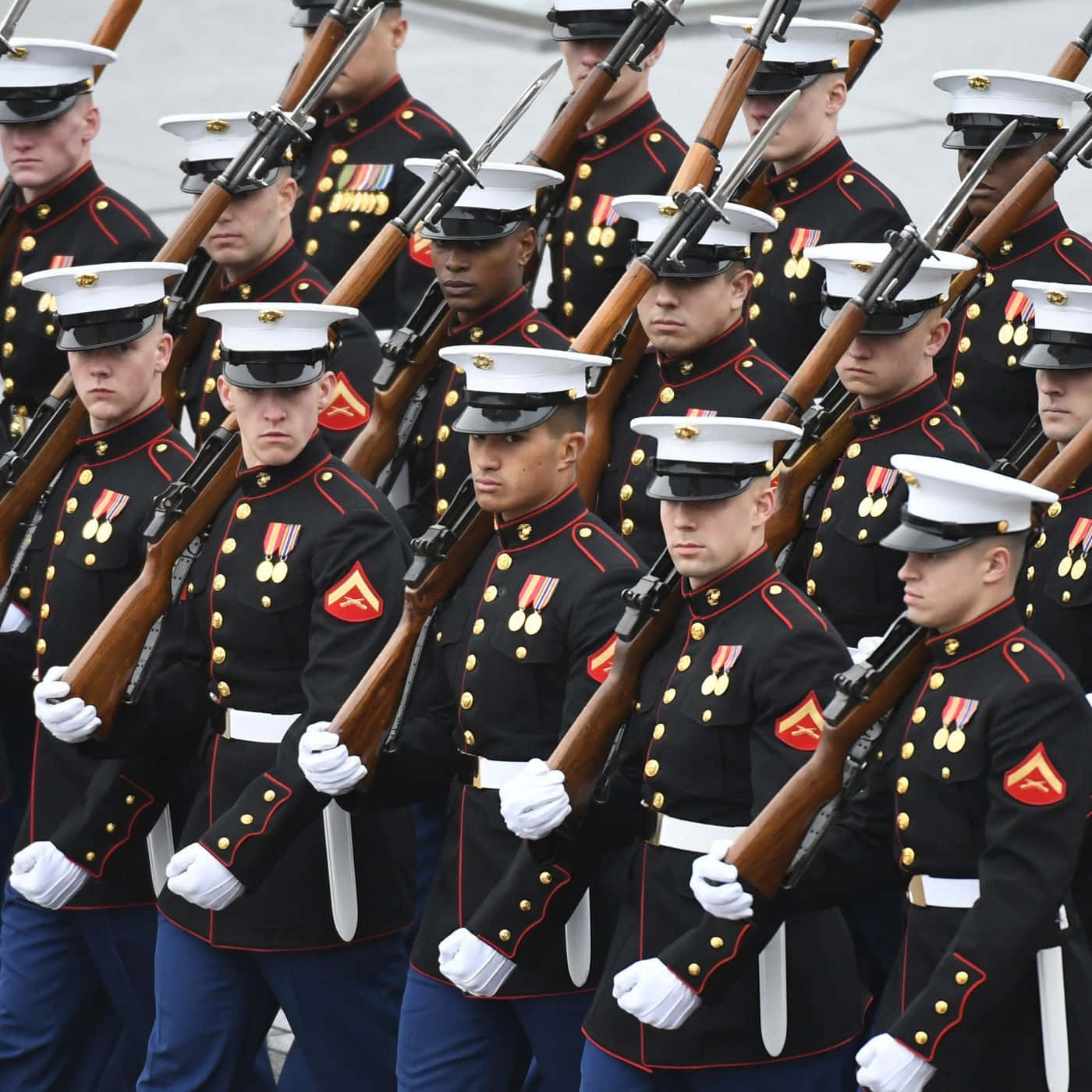 Us Marines Marching In Formation With Rifles Wallpaper