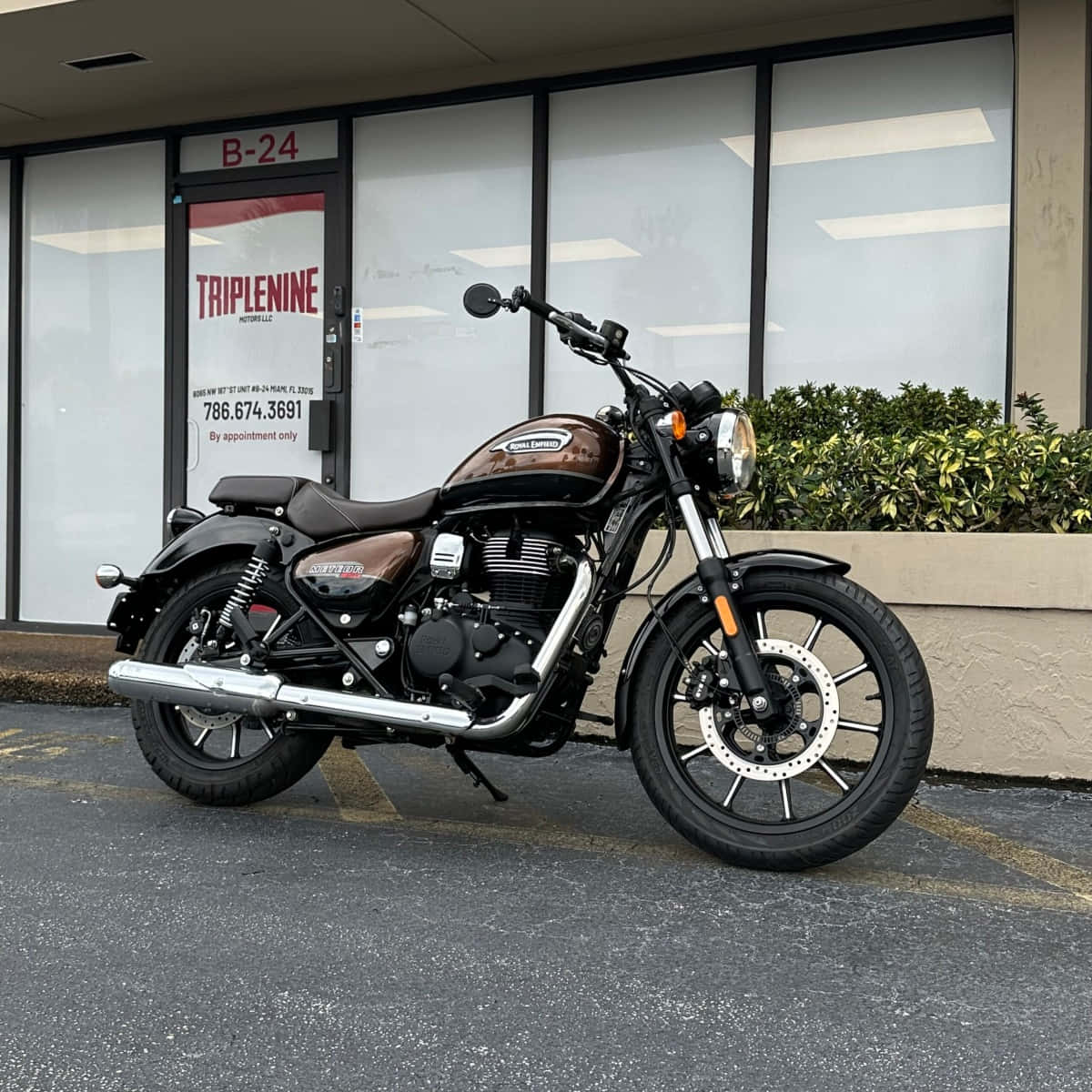 Vardenchi_ Motorcycle_ Parked_ Outside_ Building Wallpaper