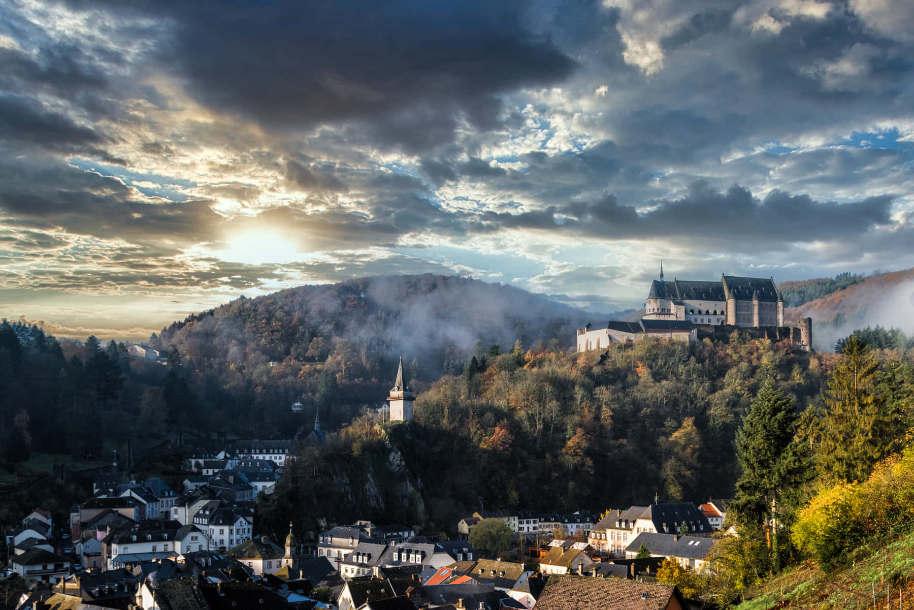 Vianden Castle Overlooking Townat Sunset Wallpaper