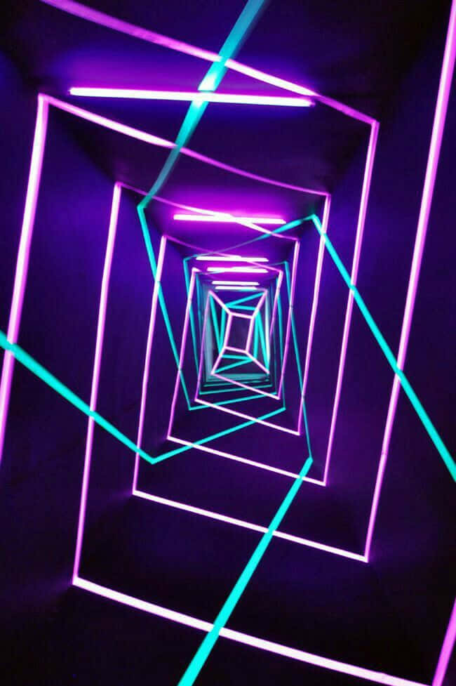 Vibrant And Mesmerizing Trippy Neon Lights Wallpaper