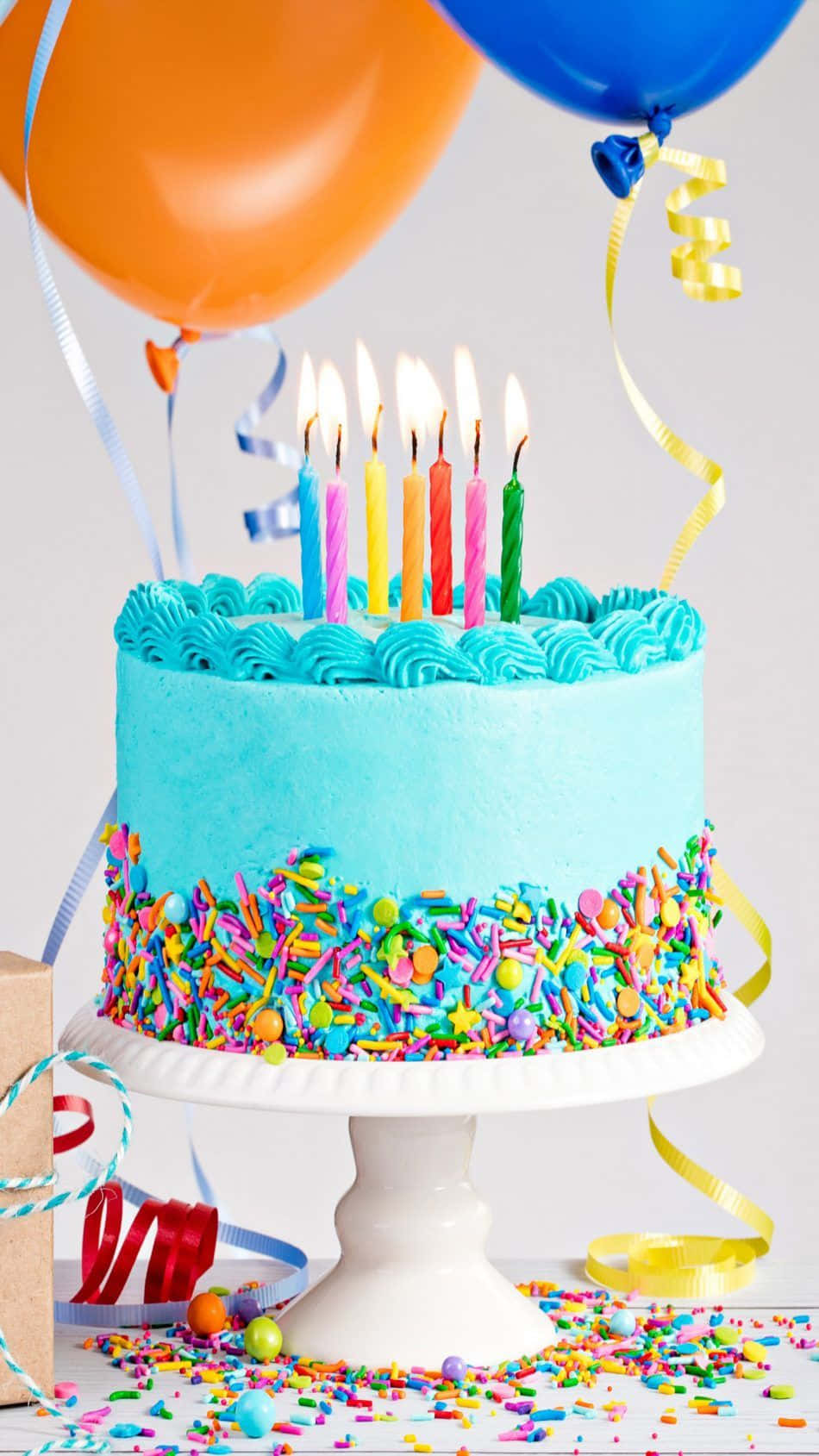 Vibrant Birthday Cakewith Candlesand Balloons.jpg Wallpaper