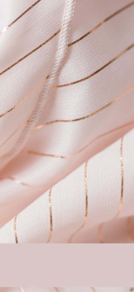 Vibrant Combination Of Light Pink And Gold Hues Wallpaper