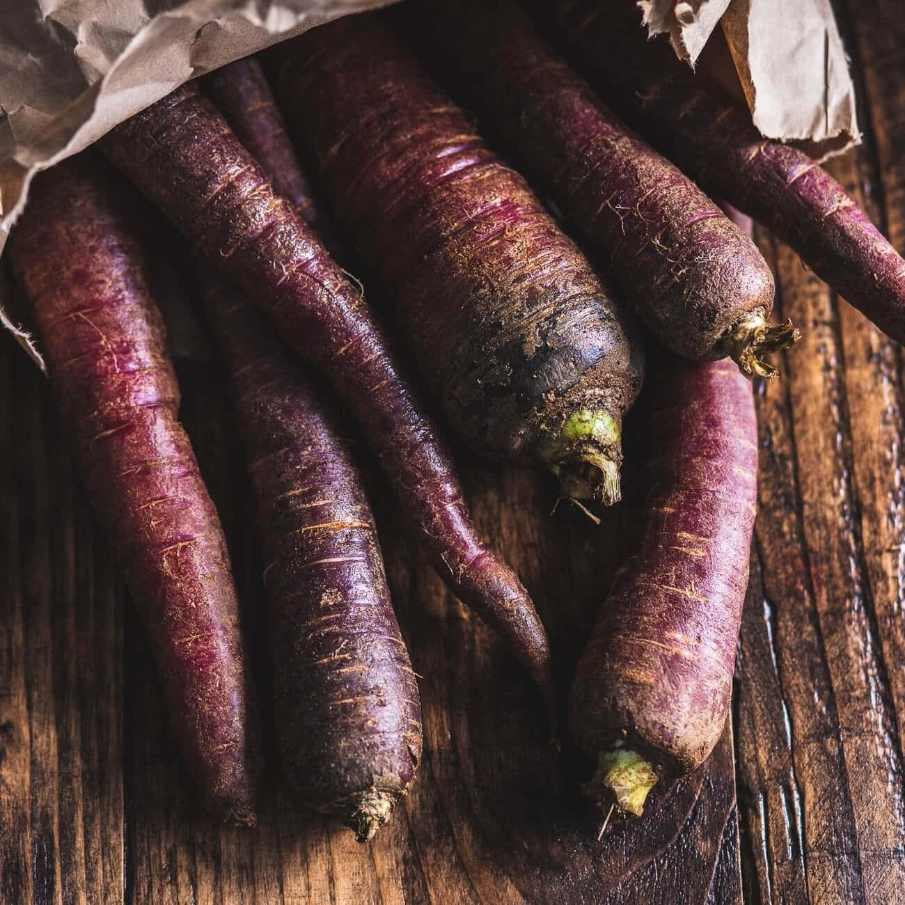 Vibrant Purple Carrots Wallpaper