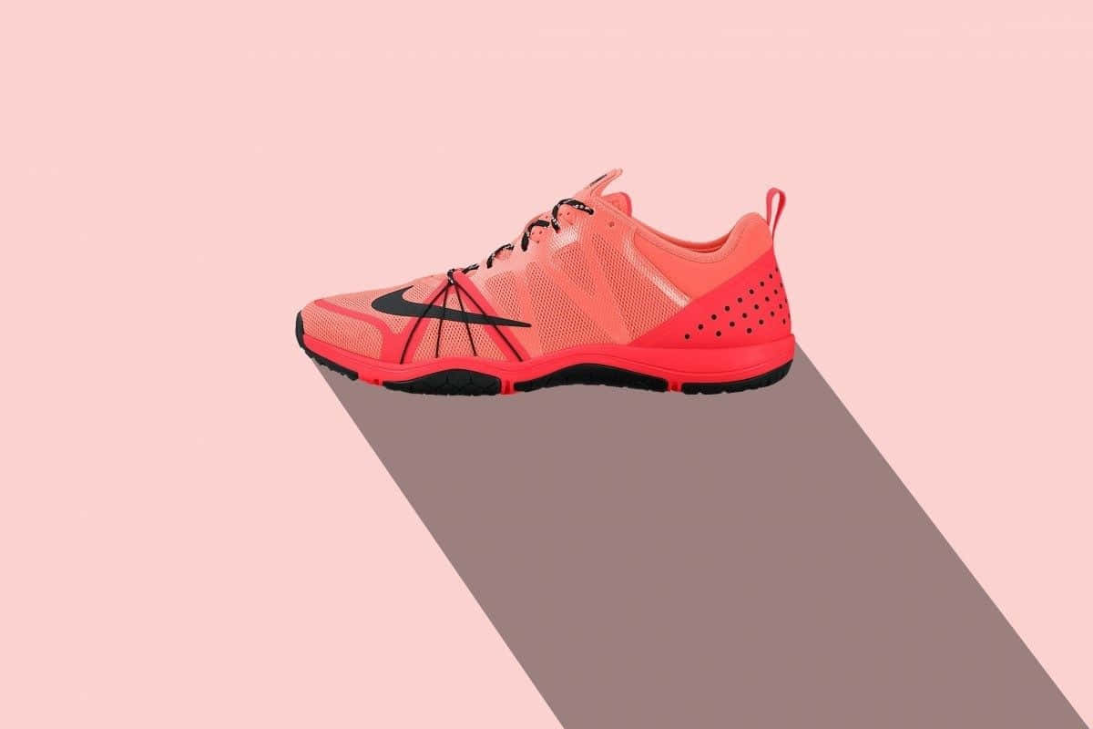 Vibrant Red Nike Sneakers – Style In Motion Wallpaper