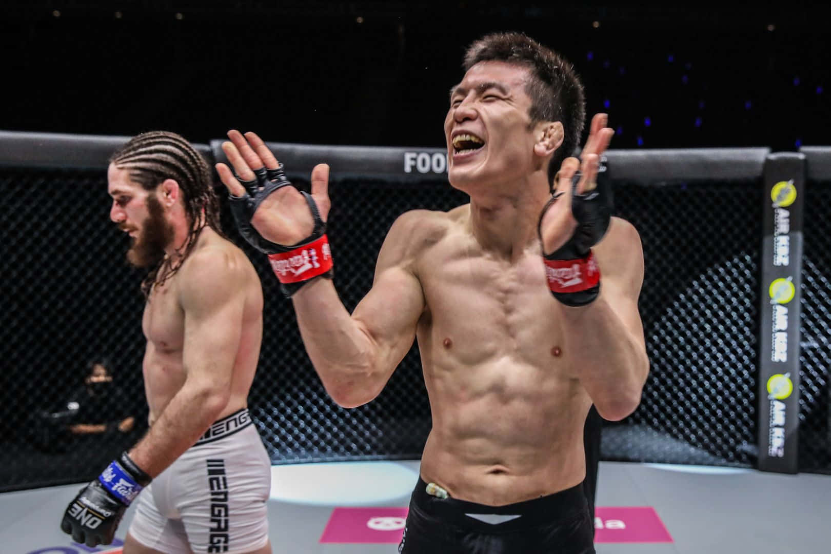 Vibrant Shot Of Shinya Aoki Applauding Wallpaper