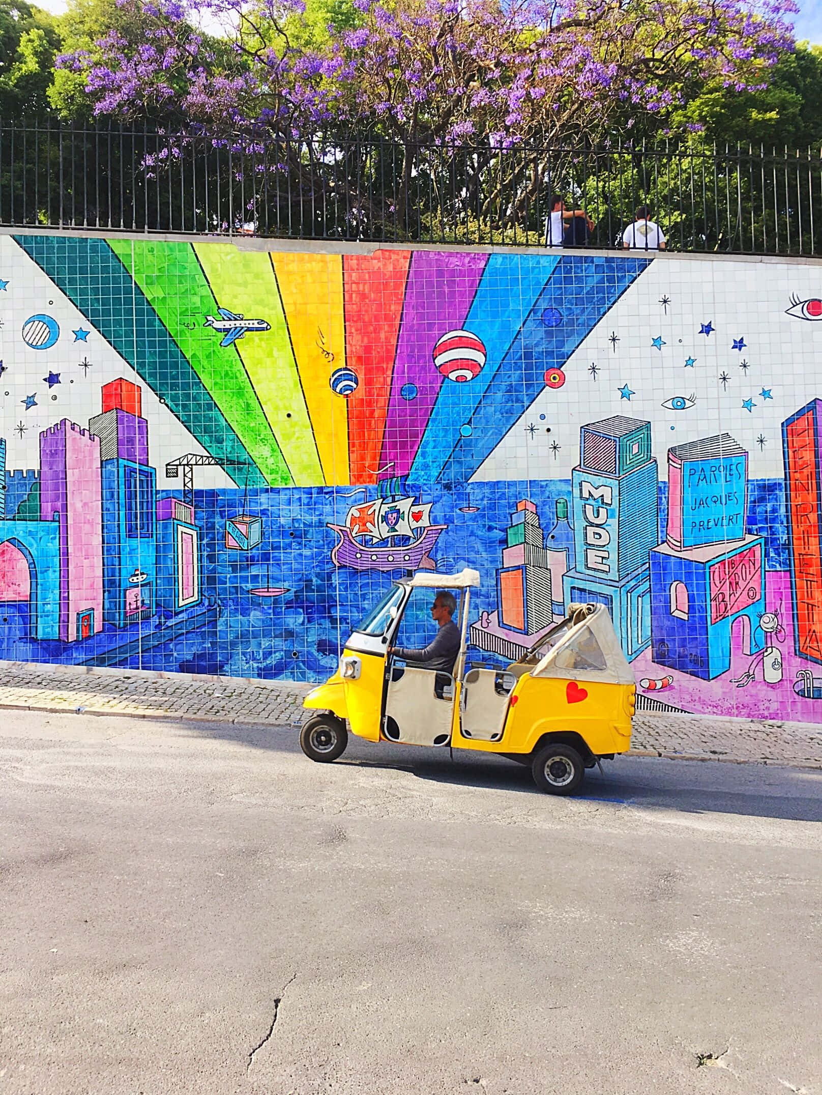 Vibrant Urban Creativity - Rainbow Graffiti Artwork Wallpaper