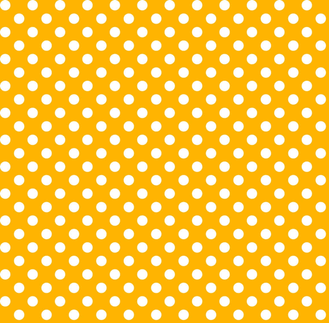 Vibrant Yellow Polka Dot Background Wallpaper