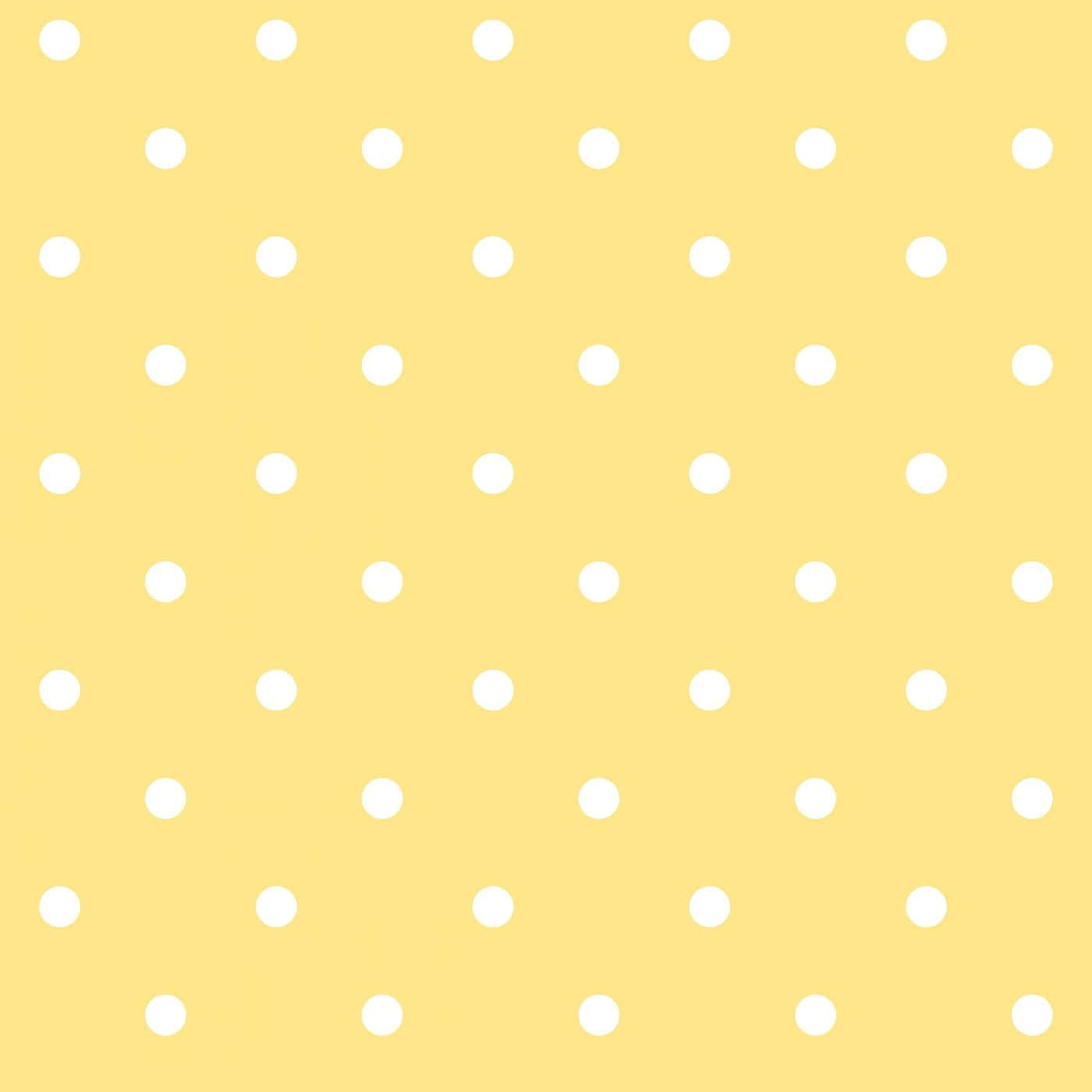 Vibrant Yellow Polka Dot Background Wallpaper