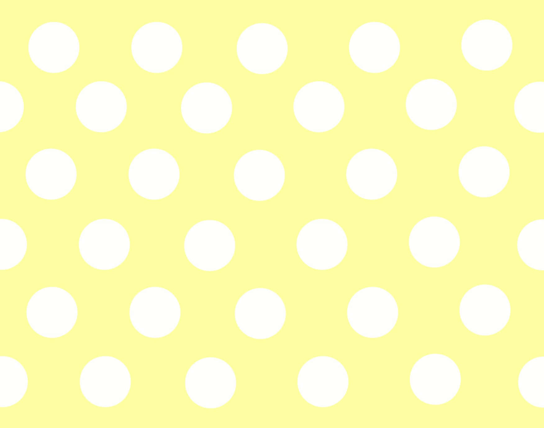 Vibrant Yellow Polka Dot Background Wallpaper