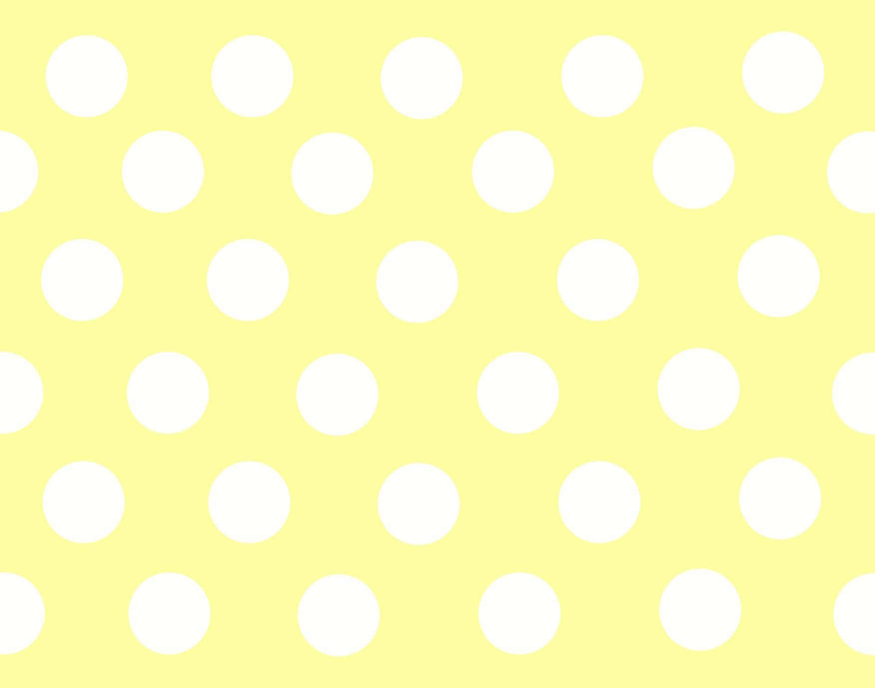 Vibrant Yellow Polka Dot Background Wallpaper