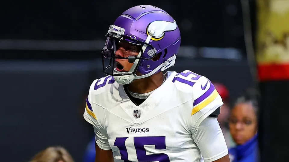 Vikings Player Intensity On Field Wallpaper