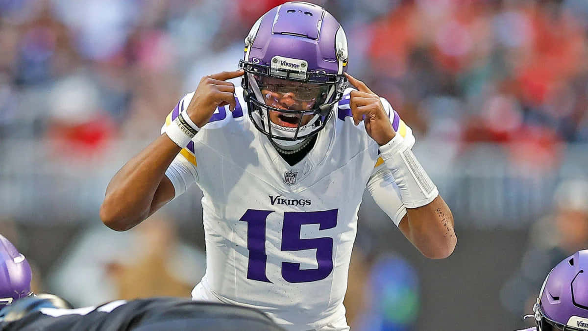 Vikings Quarterback Readyfor Snap Wallpaper