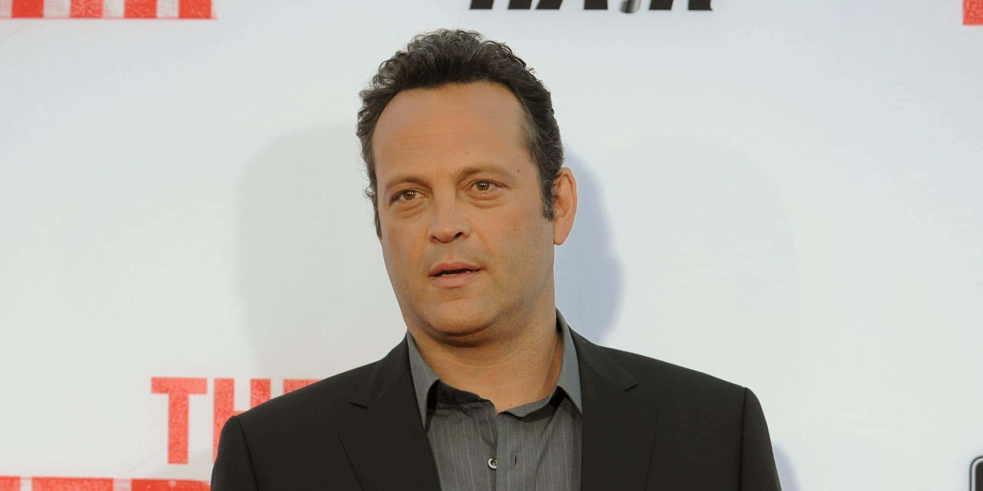 Vince Vaughn Striking A Pose During A Photoshoot Wallpaper