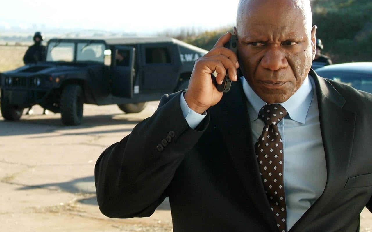 Ving Rhames Striking A Pose In A Stylish Outfit Wallpaper