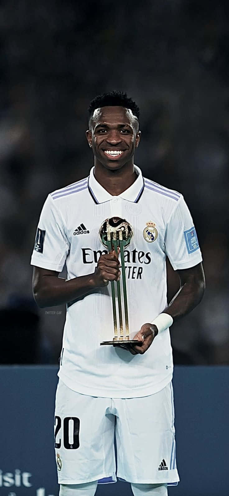 Vinicius Jr Holding Trophy Smile Wallpaper