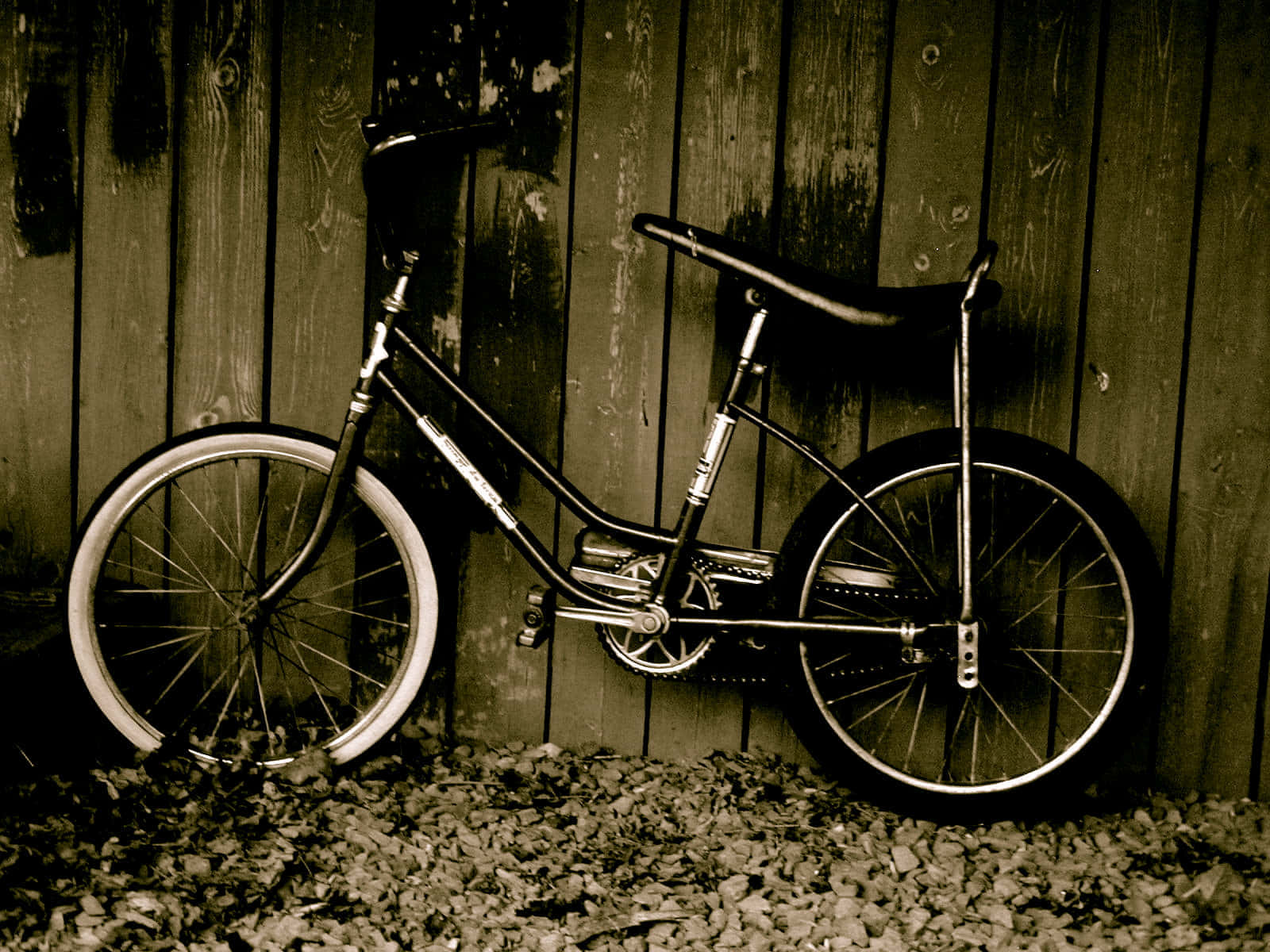 Vintage Bicycle Against Wooden Wall.jpg Wallpaper