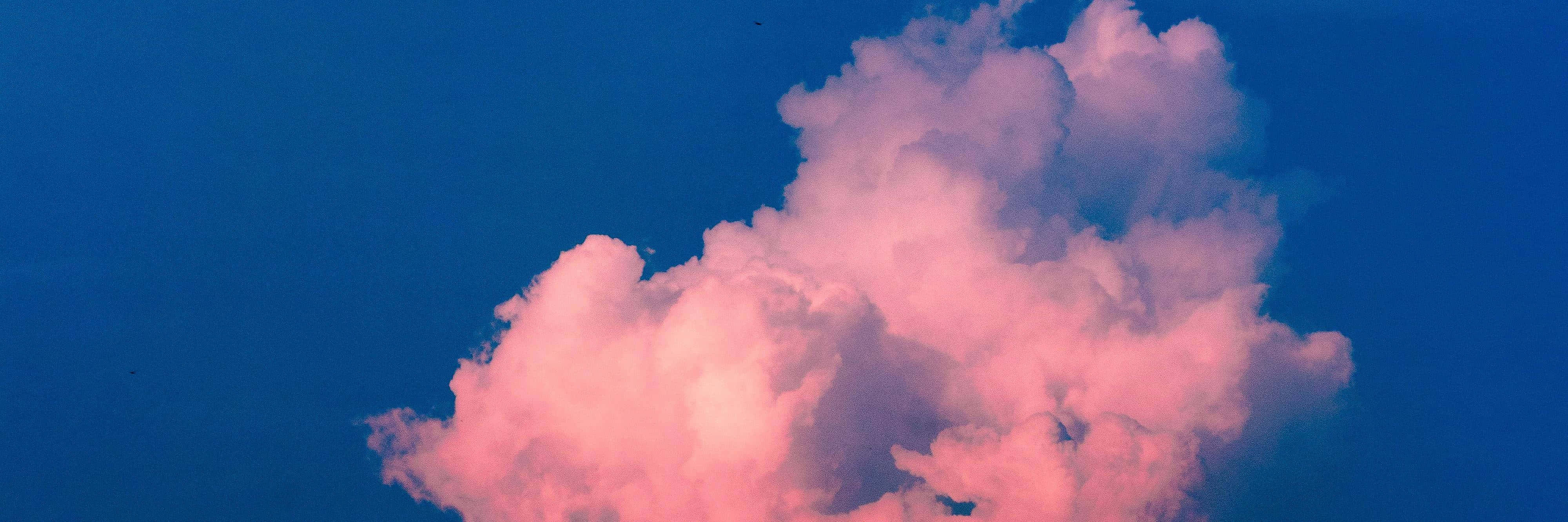 Vintage Blue Sky Pink Clouds Wallpaper