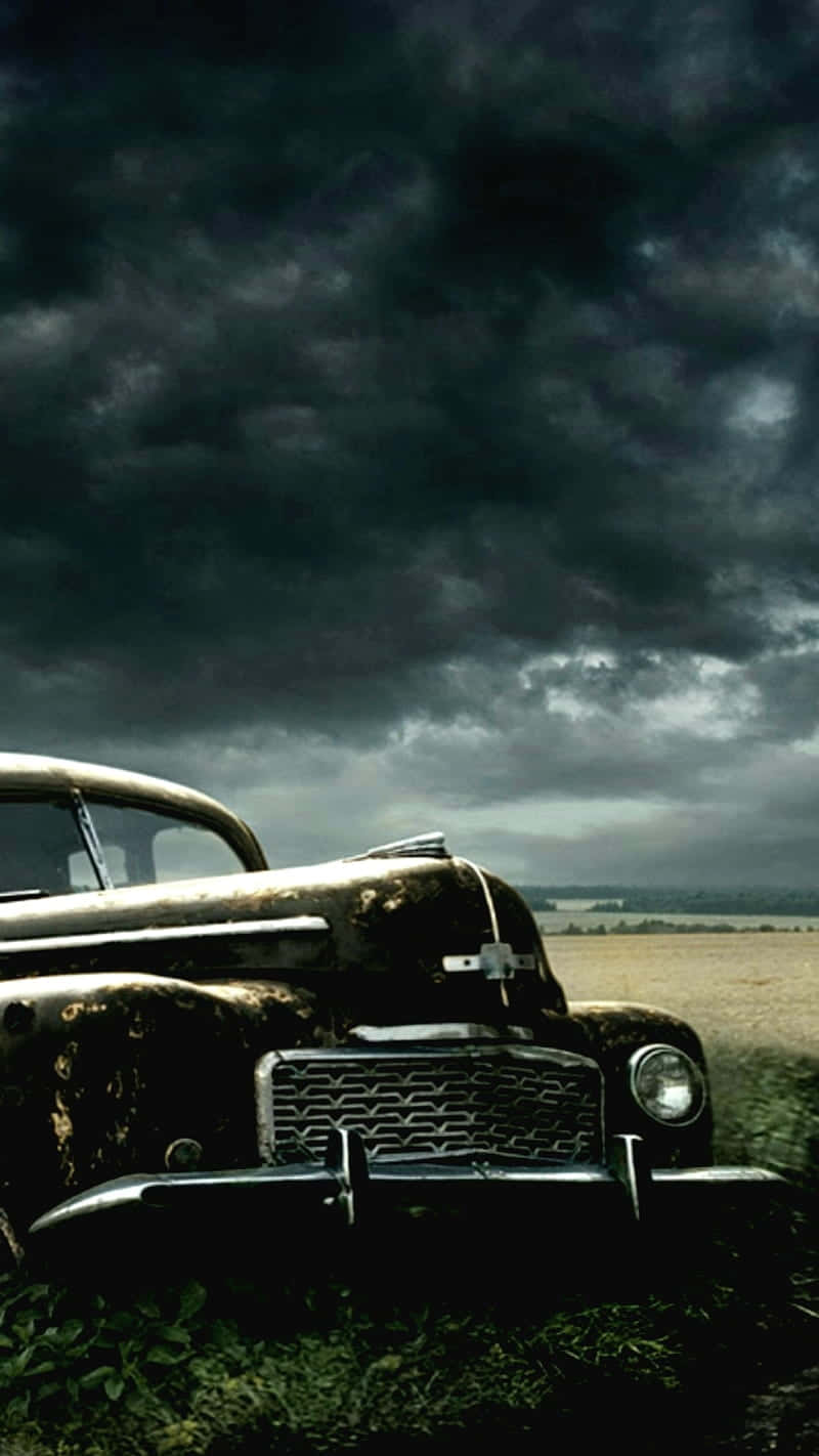 Vintage Car With Dark Sky Iphone Wallpaper