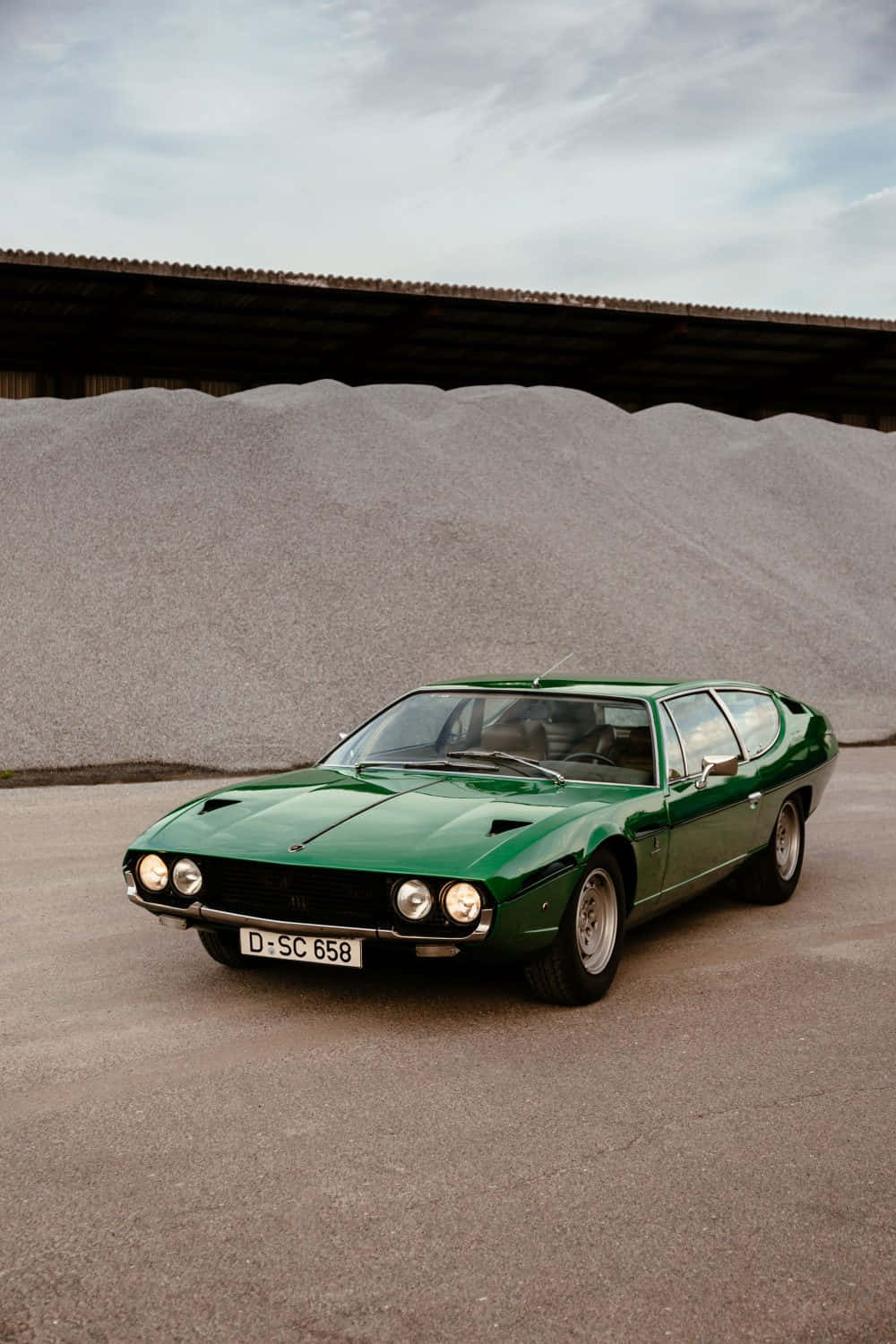 Vintage Green Lamborghini Islero Parked Wallpaper