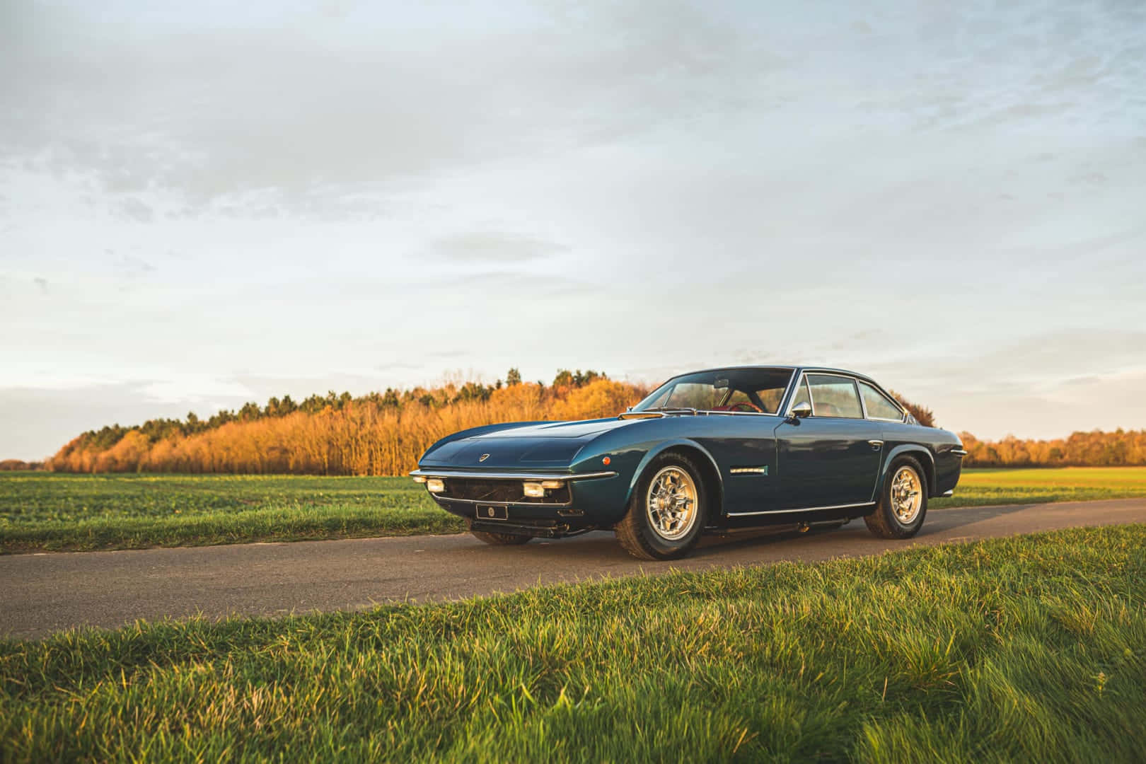 Vintage Lamborghini Islero Countryside Wallpaper