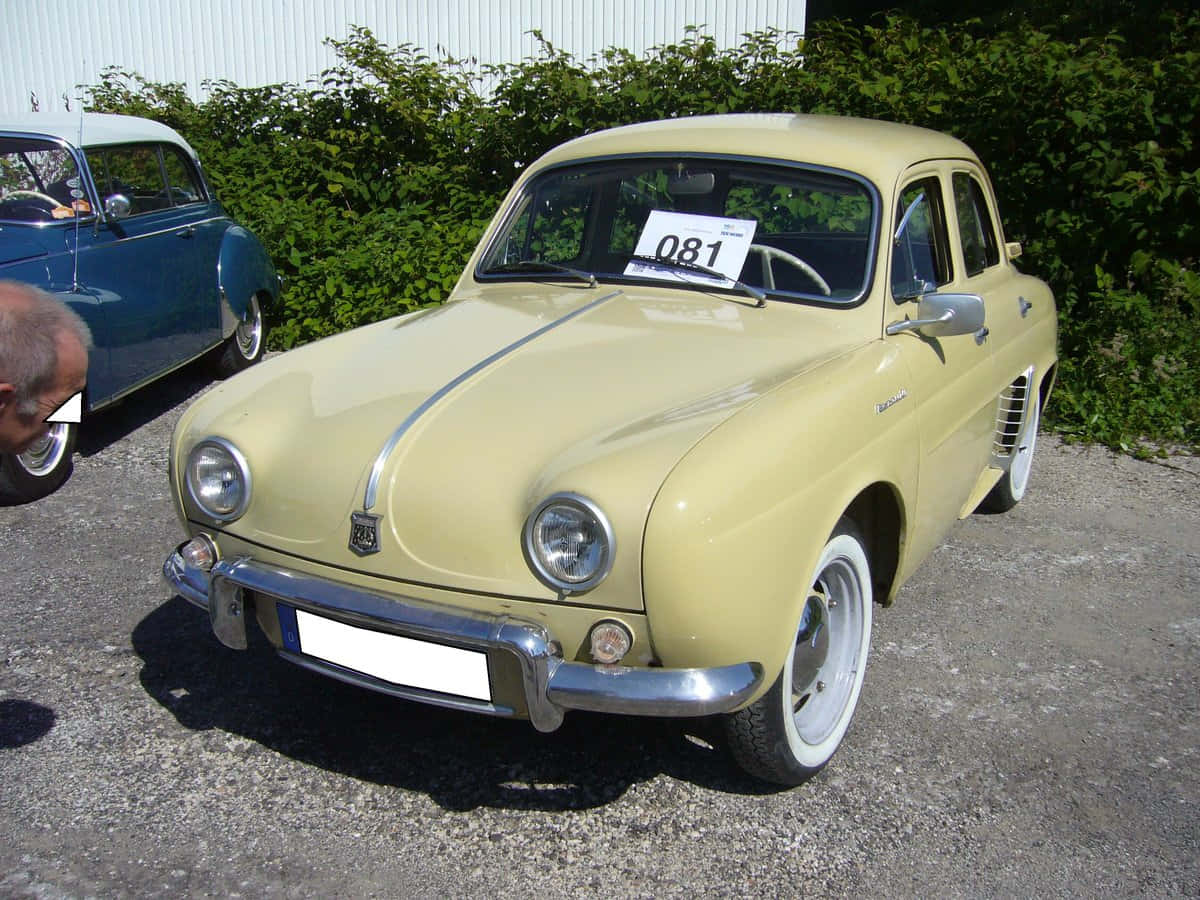 Vintage Renault Dauphine Displaying Its Elegance Wallpaper