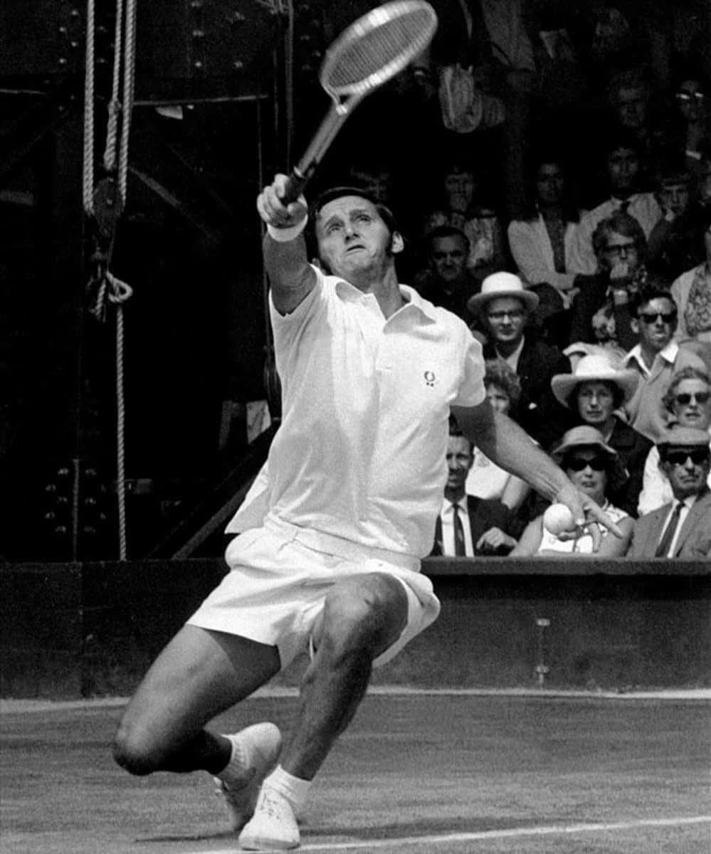 Vintage Tennis Player Action Shot Wallpaper