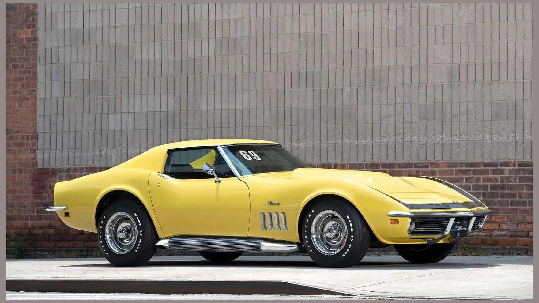 Vintage Yellow Chevrolet Corvette Stingray Wallpaper