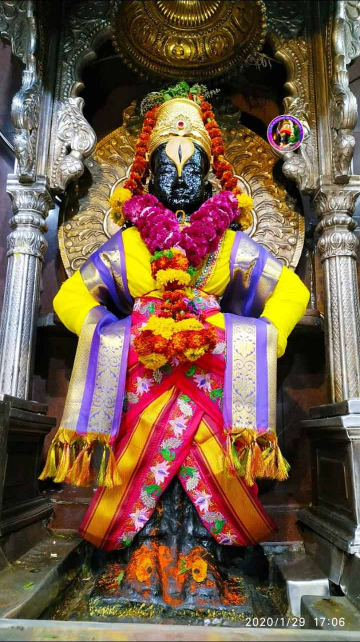 Vithu Mauli Statue In Temple Wallpaper