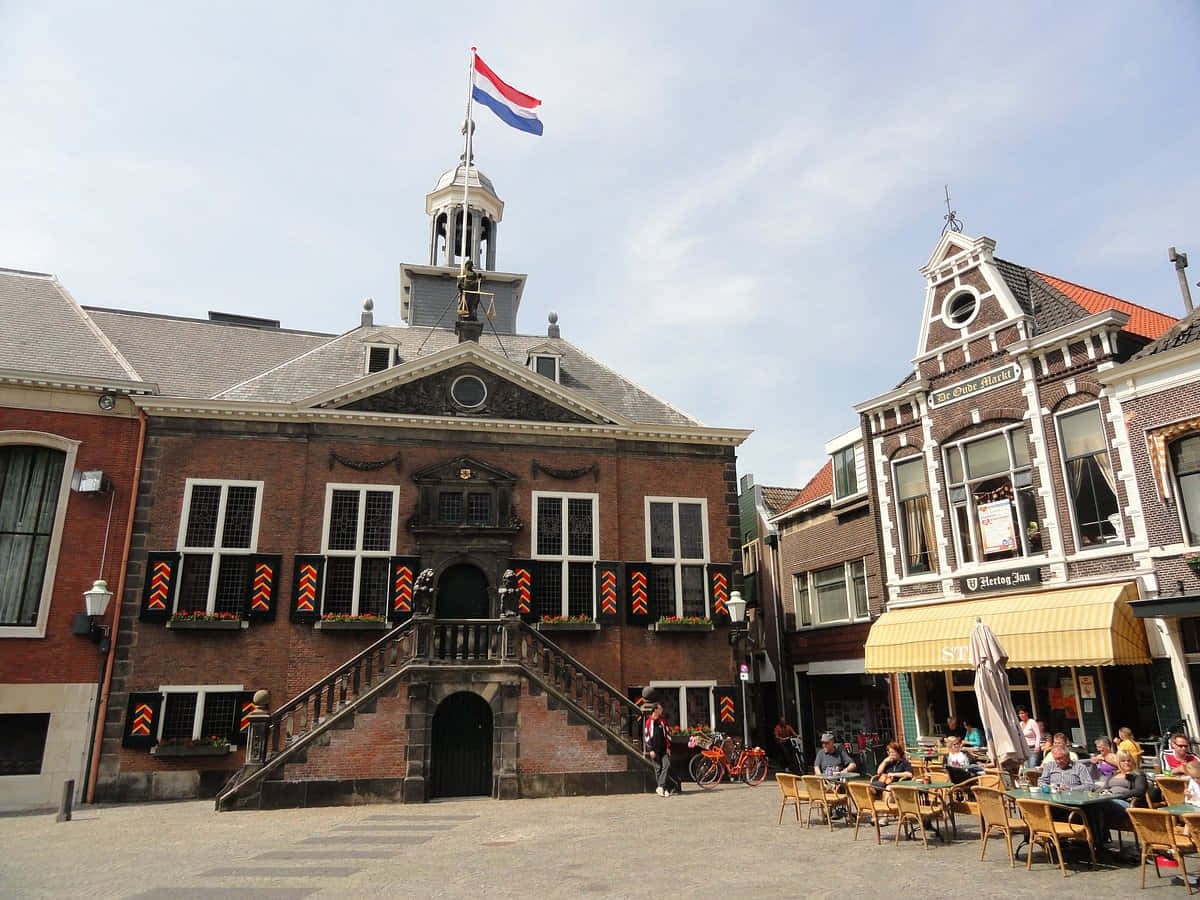 Vlaardingen Town Hallwith Dutch Flag Wallpaper