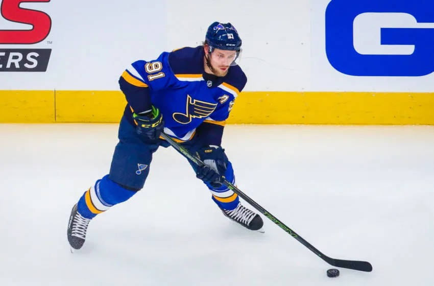 Vladimir Tarasenko Dribbling Hockey Puck On Ice Rink Wallpaper