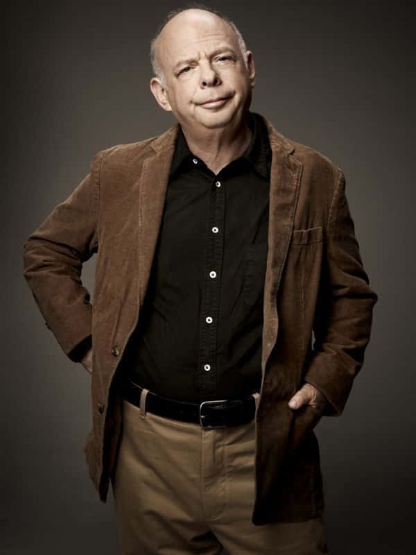 Wallace Shawn Striking A Friendly Pose Wallpaper